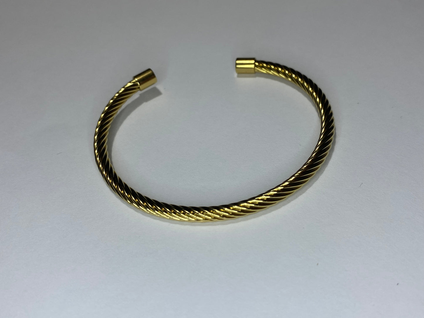 Bracciale rigido acciaio dorato