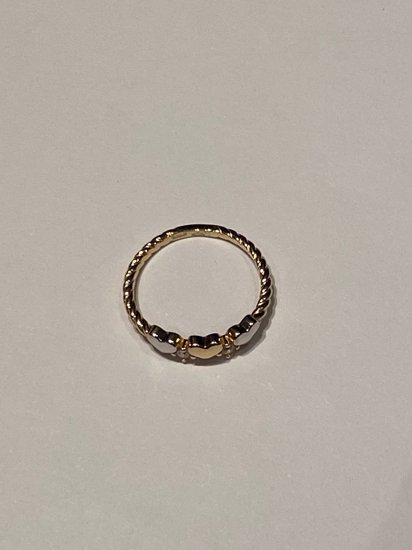 Anello cuoricini intrecciato Oro 18K