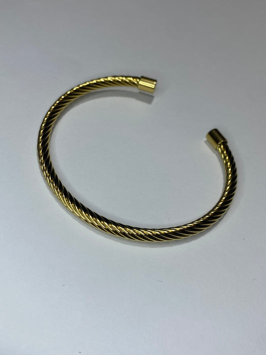 Bracciale rigido acciaio dorato