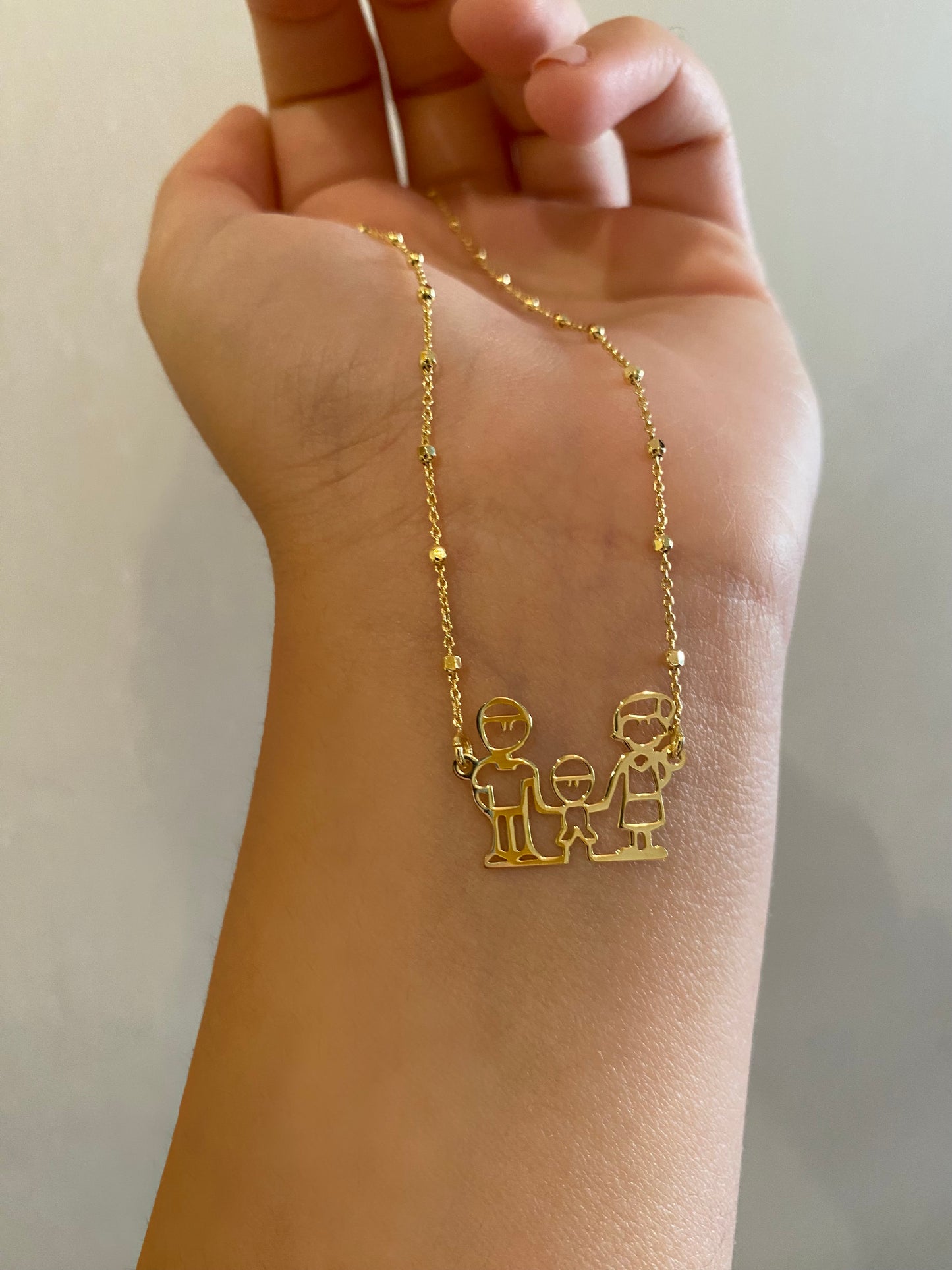 Collana Famiglia Con Bimbo in Argento Dorato