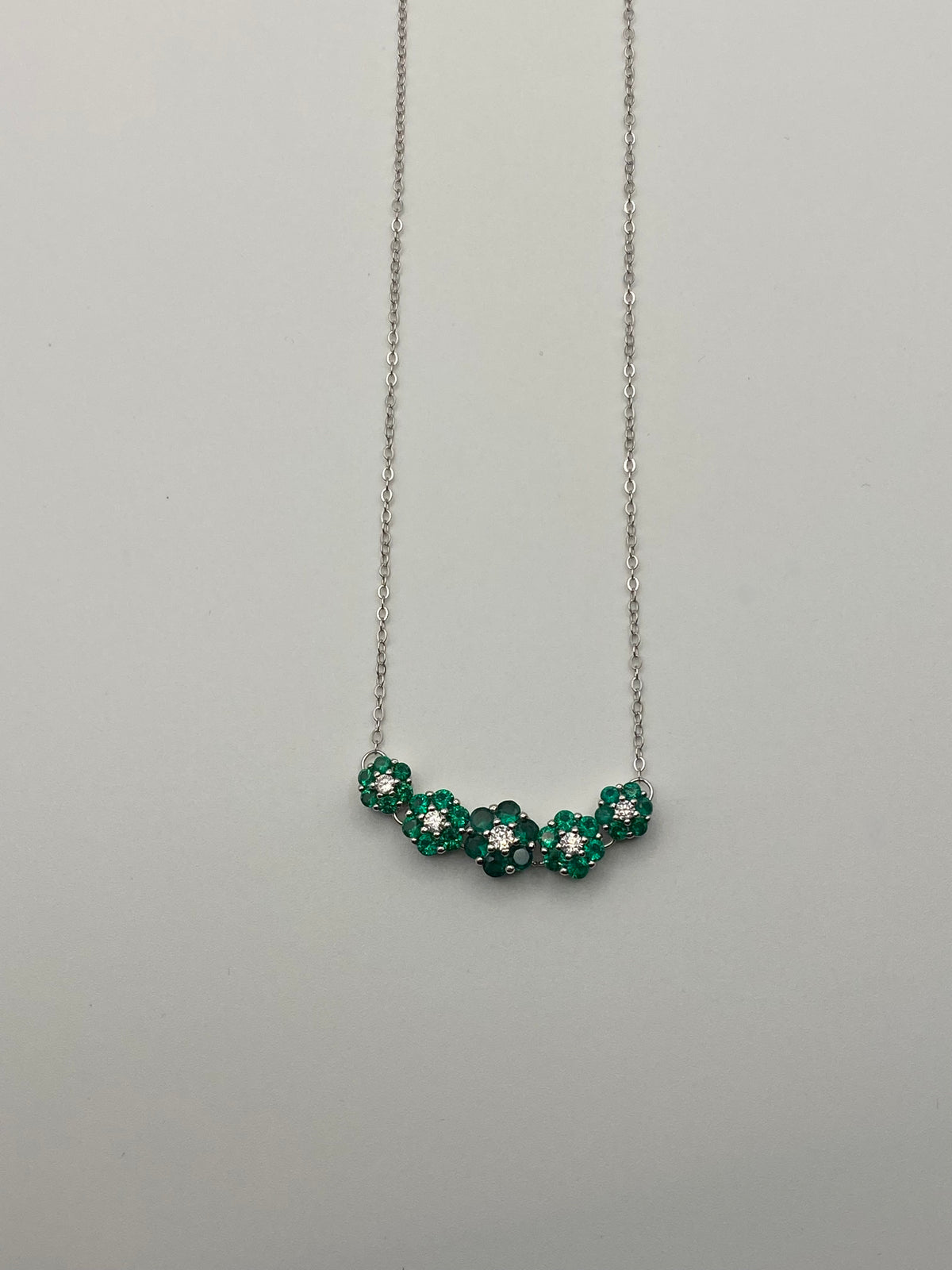 Collana Fiorellini Luminosi in argento 925 con zirconi verdi e bianchi - Zumpano Gioielli