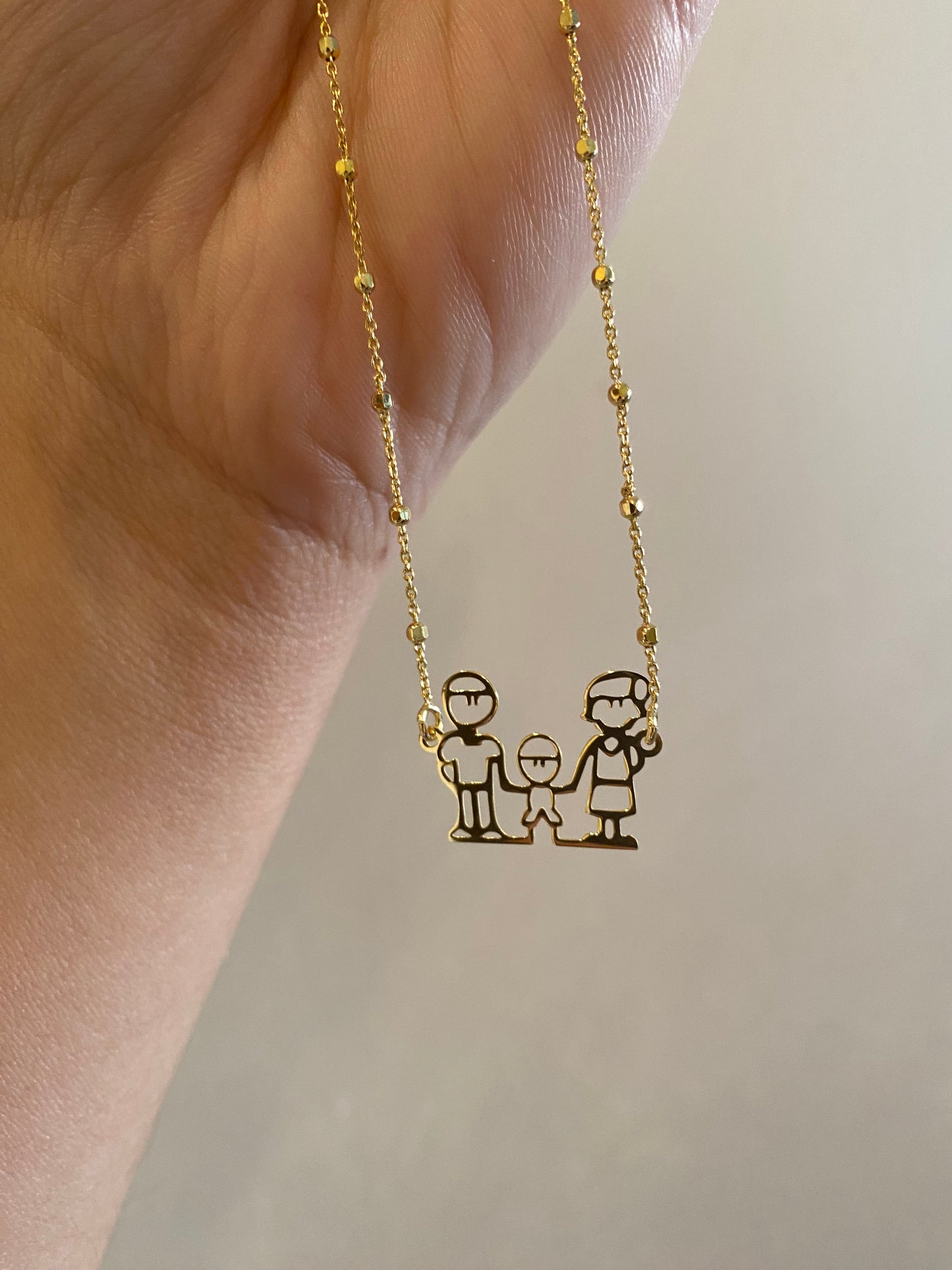 Collana Famiglia Con Bimbo in Argento Dorato