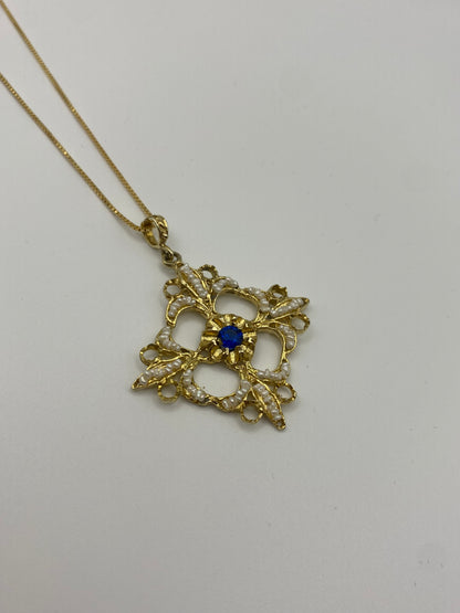 Collana con Ciondolo in argento dorato, pietra Blu e Microperle